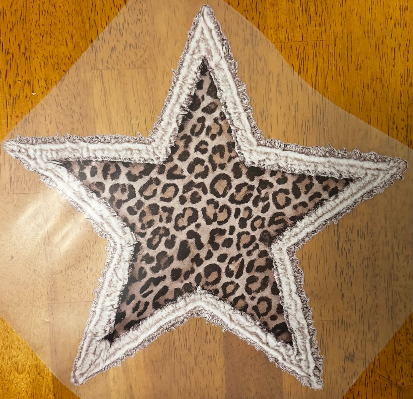 "Cheetah star faux patch”