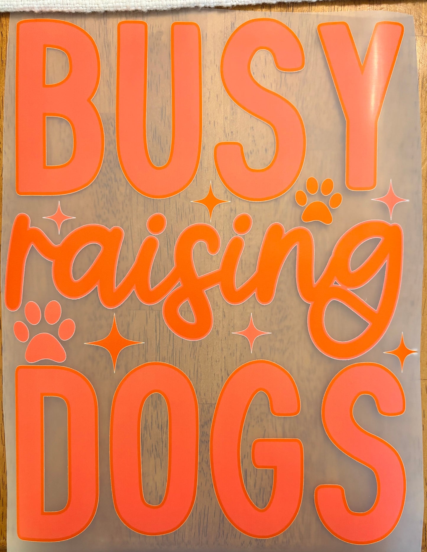 “Busy raising dogs”