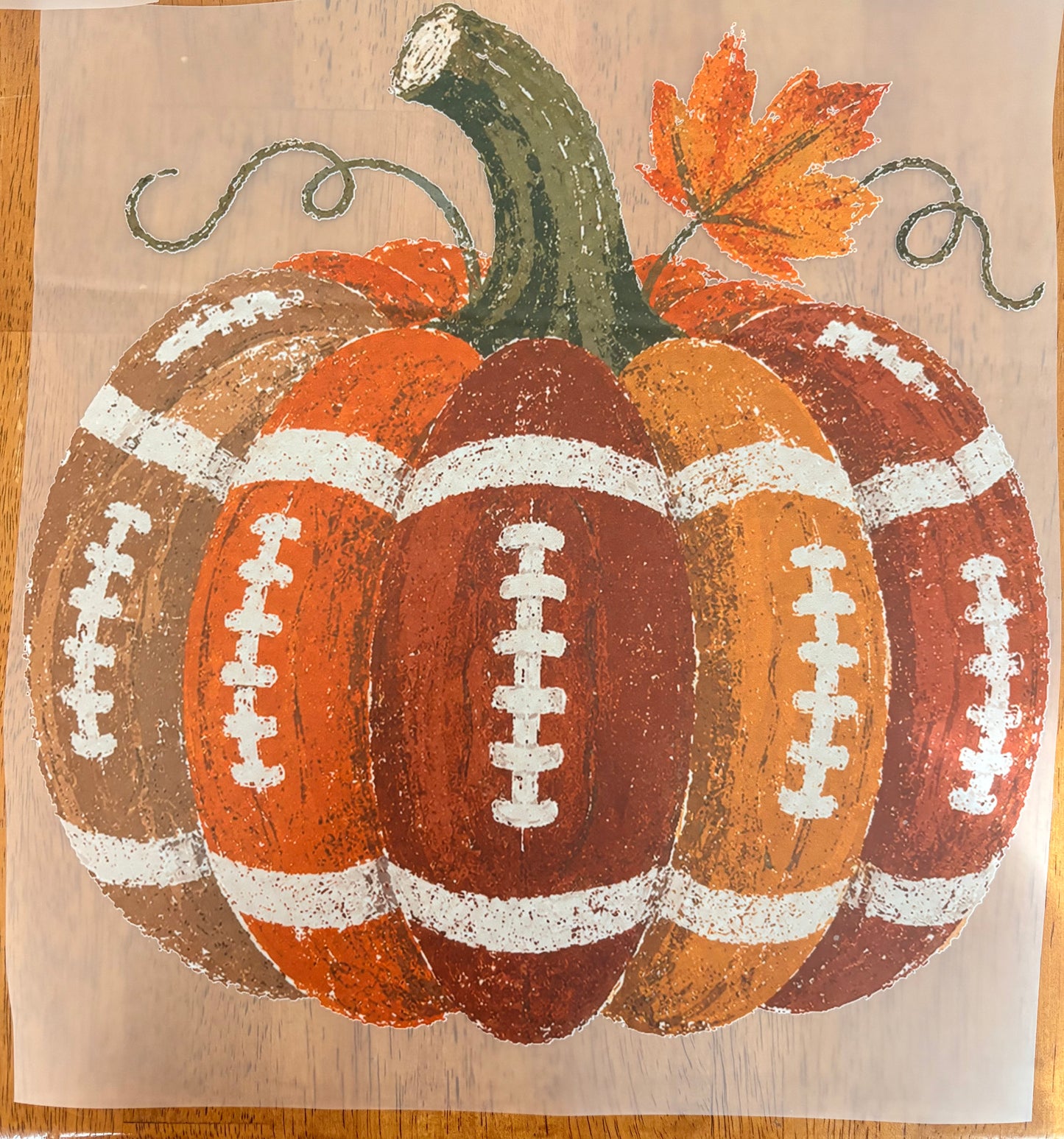 “Fall pumpkin football”